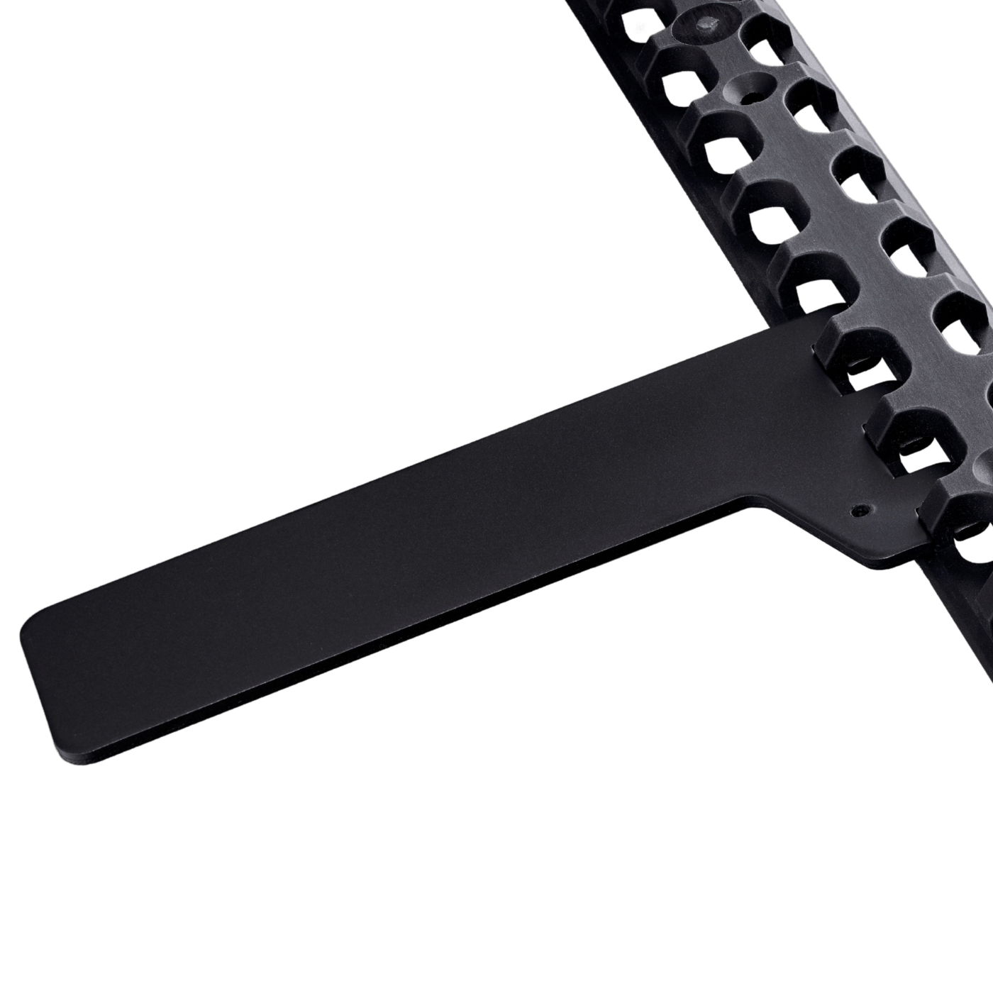A GearMate Spine with a black metal bracket attached.