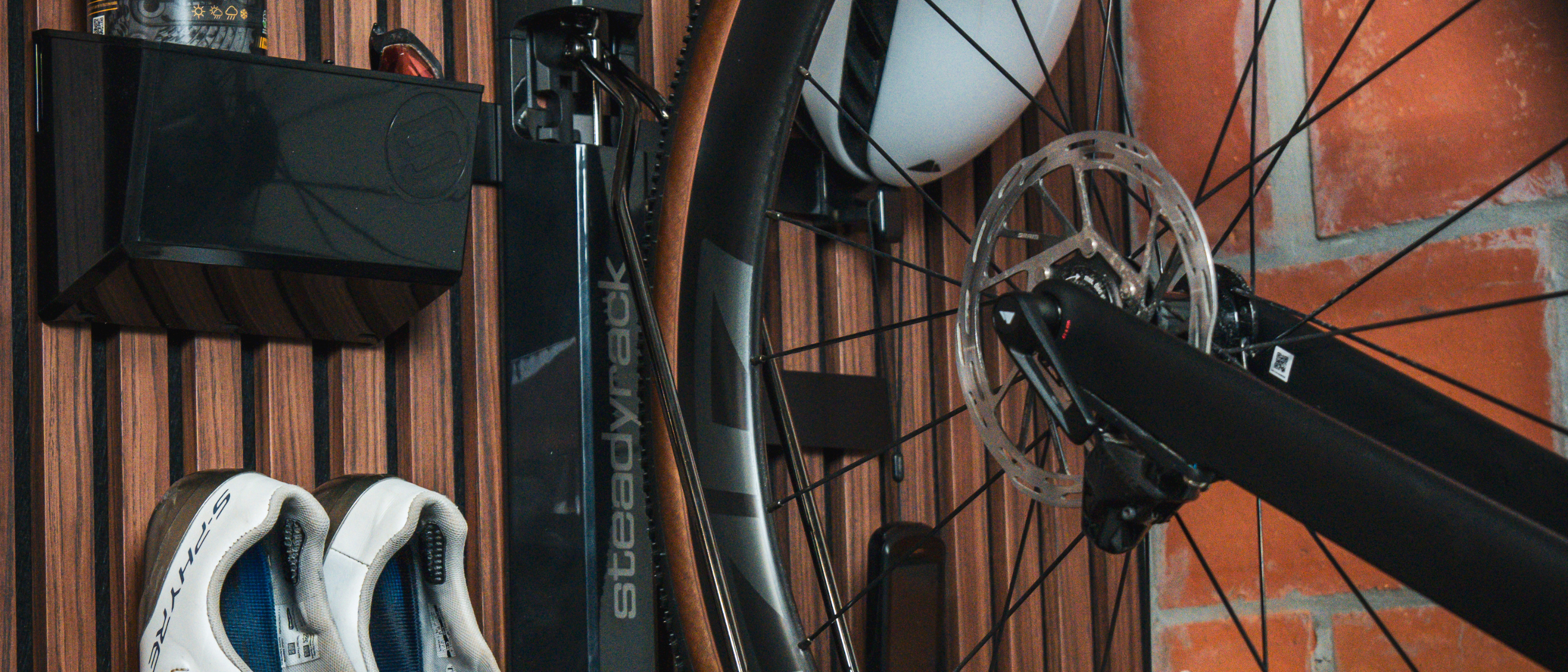 A close up of a bike in a ProFlex rack with GearMate components storing accessories.